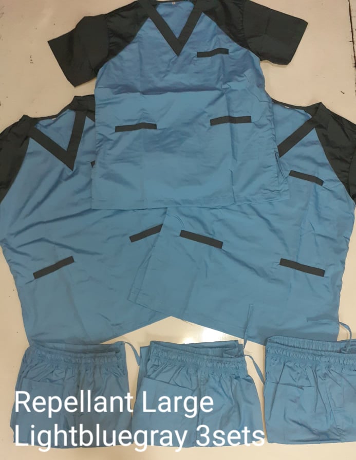 Repellant Scrub Suit by SCG Dress Shoppe